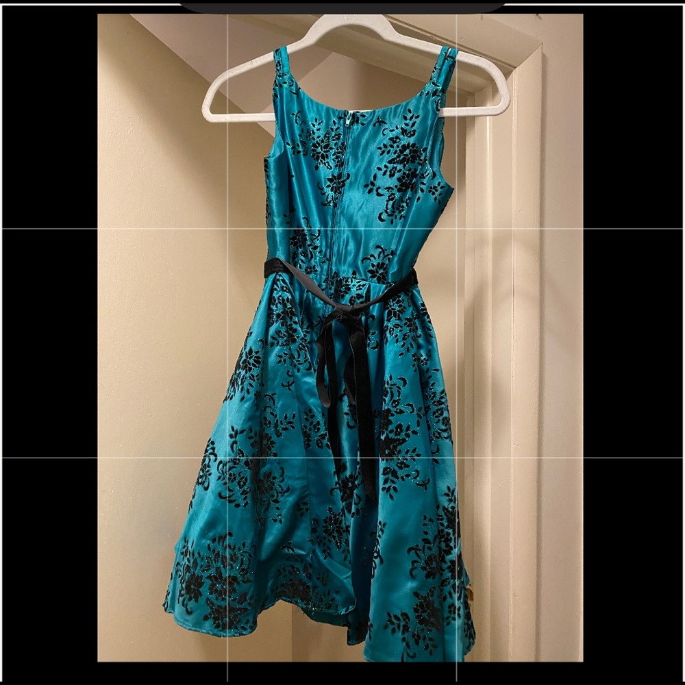 Bought at Macy’s paid $100. Worn today the Nutcracker Ballet once.